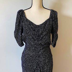 Black with white dress, with front slit.